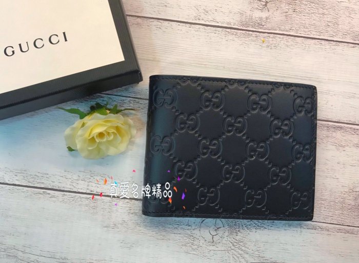 《真愛名牌精品》GUCCI 406693 黑色壓紋皮 對折 交叉短夾 **全新特價品**代購*