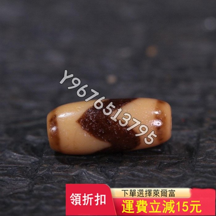 臺珠精品牙黃虎牙天珠 尺寸 ：22.0*10.5mm 精品藏 舊藏古玩 老物件 古董【華夏尋寶閣】1039