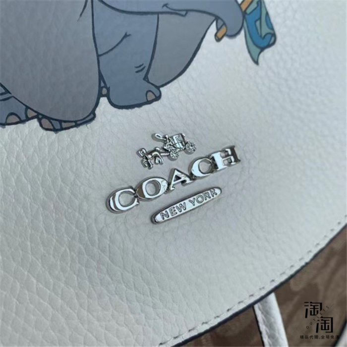 全場限時免運 COACH 91121 小飛象後背包 Disney系列 超夯 容量大 流蘇吊飾 附購證 買即送禮