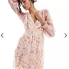 (嫻嫻屋) 英國ASOS-Vila粉紅色蕾絲邊透膚束口袖荷葉摺邊裝飾花卉印花洋裝禮服 AC24