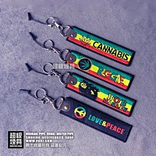 【P887 超級煙具】 獨家發行~大麻葉手機布牌扣~附有3.5 mm 耳機孔塞 (810043)