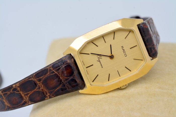 《寶萊精品》RADO 雷達表金黃長型手動女子錶
