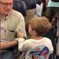 Friendly Kid Greets Every Passenger on Plane