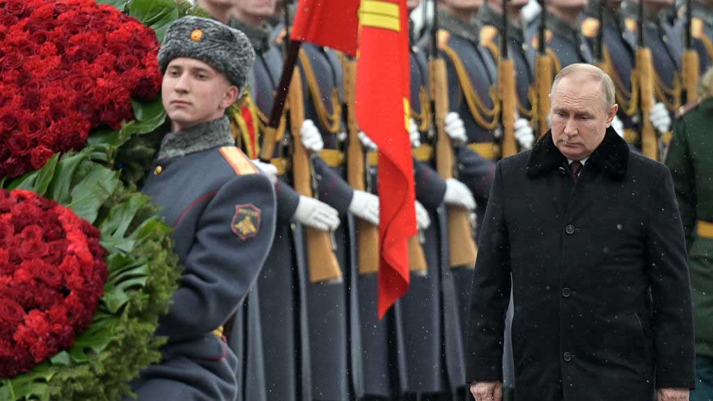 Vladimir Putin takes part in a wreath laying ceremony at the Tomb of the Unknown Soldier in Moscow's Alexander Garden on Defender of the Fatherland Day.