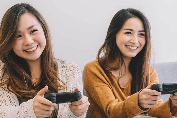 Two women playing video games