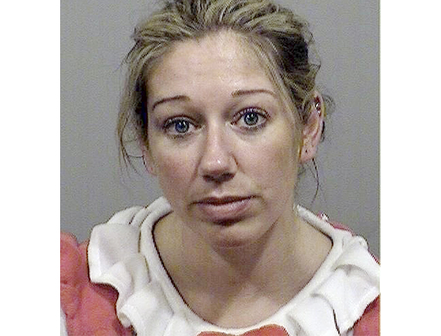 Police say Carrie Gipson, 37, who was wearing a red and white Hello Kitty costume, minus the doll&#39;s mammoth head, was stopped because she driving in the ... - embed