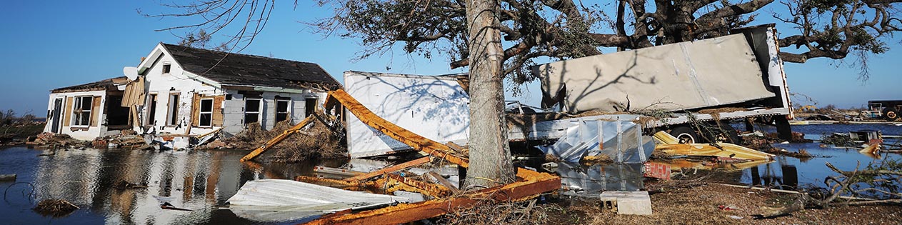 OCTOBER 10, 2021: Flood waters from Hurricane Delta surround structures destroyed by Hurricane Laura on October 10, 2020 in Creole, Louisiana. (Getty)