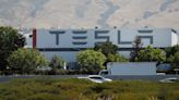 Tesla is sued over emissions from California plant