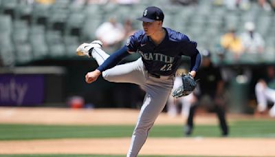 Bryan Woo and 3 relievers combine for 2-hit shutout as Mariners stop A's 2-0