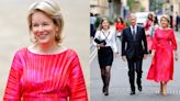 Queen Mathilde of Belgium Thinks Pink in Accordion Midi Dress for Daughter Princess Elisabeth’s Oxford Graduation