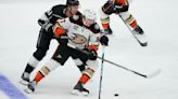 Ducks' Leo Carlsson helped off ice at practice after collision