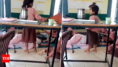 On camera: Teacher taking nap, students fanning her | India News - Times of India