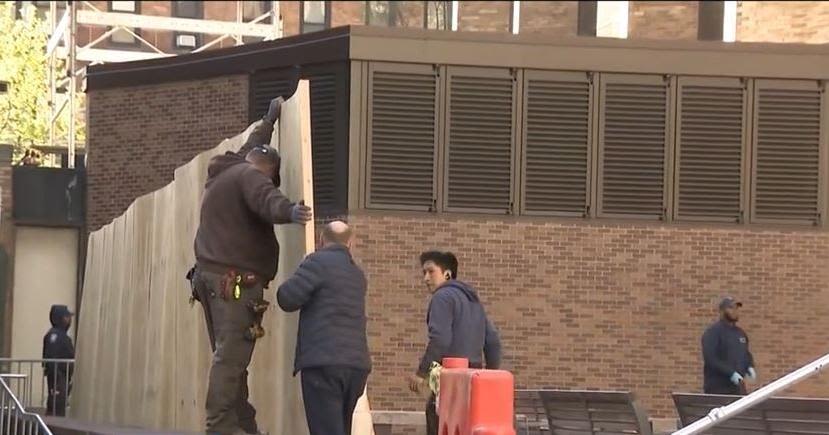 NYU responds to protests with plywood wall; Mayor Adams says outside agitators may be stirring things up