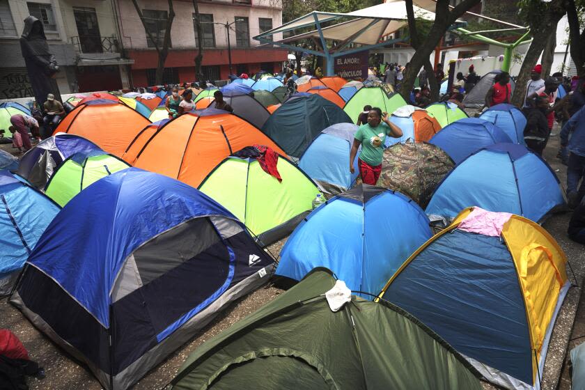 This gentrifying Mexico City neighborhood has a Soho House — and a migrant encampment