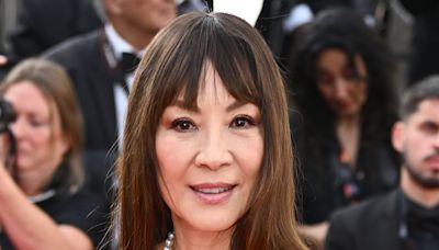 Michelle Yeoh, 61, cuts a glamorous figure in maroon bodice at Cannes