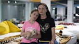 Mother who fled Ukraine hopes she can get treatment for daughter in Germany