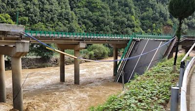 11 dead and dozens missing in China after bridge collapses during flooding