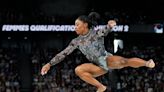 Simone Biles shakes off calf injury to dominate during Olympic gymnastics qualifying