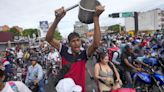 Opposition says it has proof Maduro challenger won as Venezuela braces for more unrest