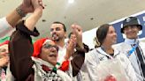 Palestinian Olympic team greeted with cheers and gifts in Paris