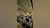 Damage inside Singapore Airlines plane after British man dies following severe turbulence