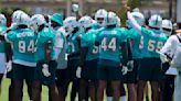 Dolphins sign offensive lineman, cornerback off rookie minicamp invitations