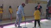 Orioles catcher James McCann visits Harlem Park Elementary Middle School