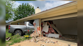 Truck crashes into house in Longview, cause unknown