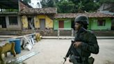 Gunfire, bombs as Colombia guerrillas flex muscles ahead of COP16