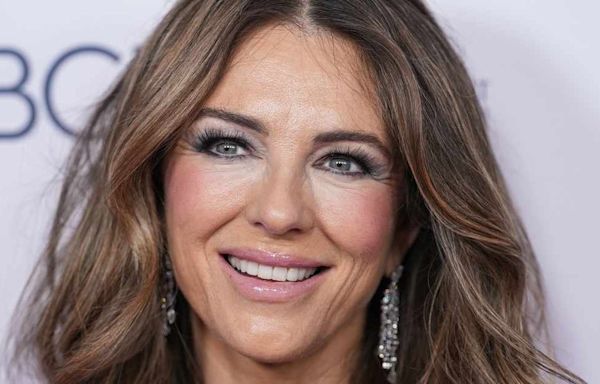 Elizabeth Hurley Shows Off Curves in Body-Hugging Hot Pink Gown for Special Event