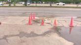 'It just flows all day long' | Leaking fire hydrant damages driveway of Houston business