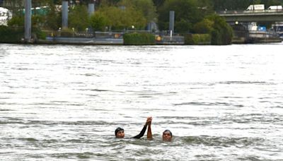 Paris mayor dips into the Seine River to showcase its improved cleanliness before Olympic events