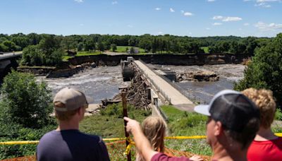 Minnesota family that lost home to flood vows to reopen store as more storms hit the Northeast