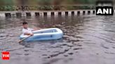 Watch: This BJP neta rows boat through waterlogged streets of Delhi amid severe rainfall | Delhi News - Times of India