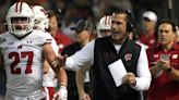 Meet 2 Wisconsin assistants. Mike Brown played wide receiver and quarterback. Colin Hitschler learned to love coaching on the knee of his father.