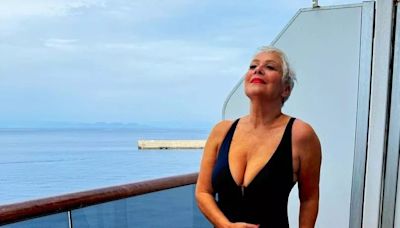 Denise Welch celebrates becoming a 'pensioner' by stripping down in plunging swimsuit
