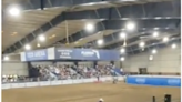 Harrowing moment bull crashes through barrier and leaps into crowd at Florida rodeo