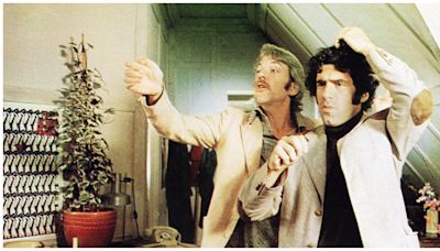 Elliott Gould Pays Tribute To ‘MASH’ & ‘S*P*Y*S’ Co-Star Donald Sutherland: “This Profoundly Hurts...