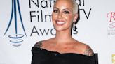 Amber Rose insists she and Chris Rock are just 'good friends' following dating rumour