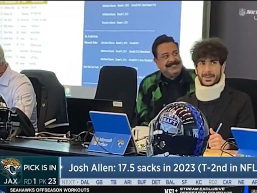 Tony Khan Wears A Neck Brace During The NFL Draft