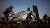 Tens of thousands ride bikes on typically busy Dubai highway