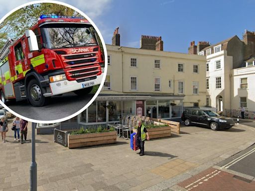 Person receives medical attention following seafront blaze