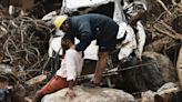 Rescuers search through mud and debris as deaths rise to 151 in landslides in southern India