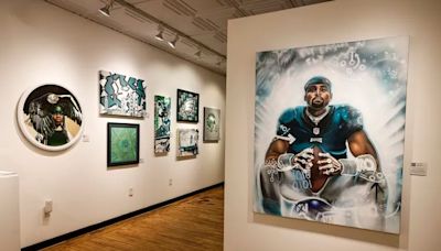 The Eagles curated their own charity art gallery. Here are some of our favorite pieces — including an eagle feasting on a Cowboys player.