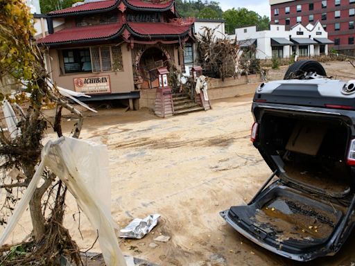 People moved to Asheville to escape extreme weather. They forgot its tragic history.