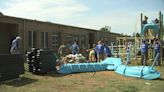 Volunteers install playground at school in west Charlotte