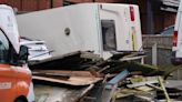 'Tornado' overturns caravan and damages buildings in Staffordshire as high winds batter UK