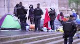 Ahead of the Paris Olympics, police clear a migrant camp near City Hall