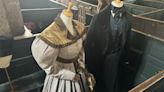 Gentleman Jack costumes displayed at wedding venue