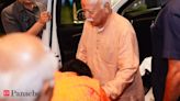 Anant Ambani seeks blessings from RSS chief Mohan Bhagwat by touching his feet - The Economic Times